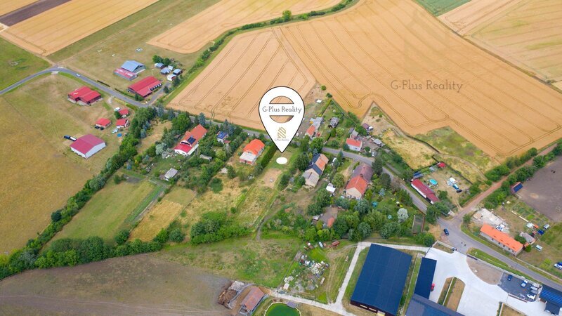 Prodej pozemku 1 200 m², Charvátce u Loun