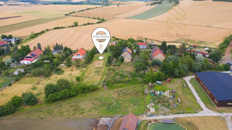 Prodej pozemku 1 200 m², Charvátce u Loun