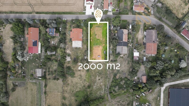 Prodej pozemku 2 000 m², Charvátce u Loun